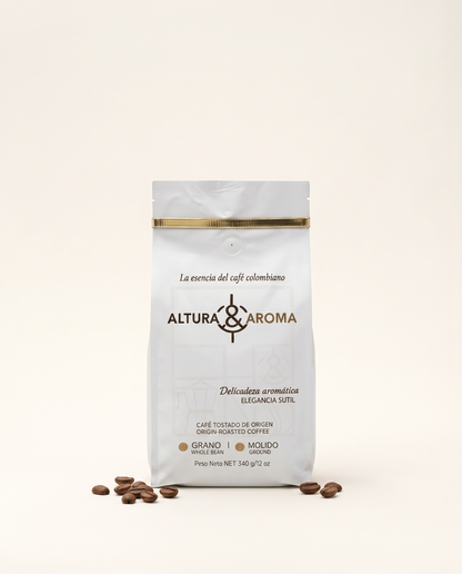 Altura y Aroma Geisha Washed — white and gold coffee bag, front